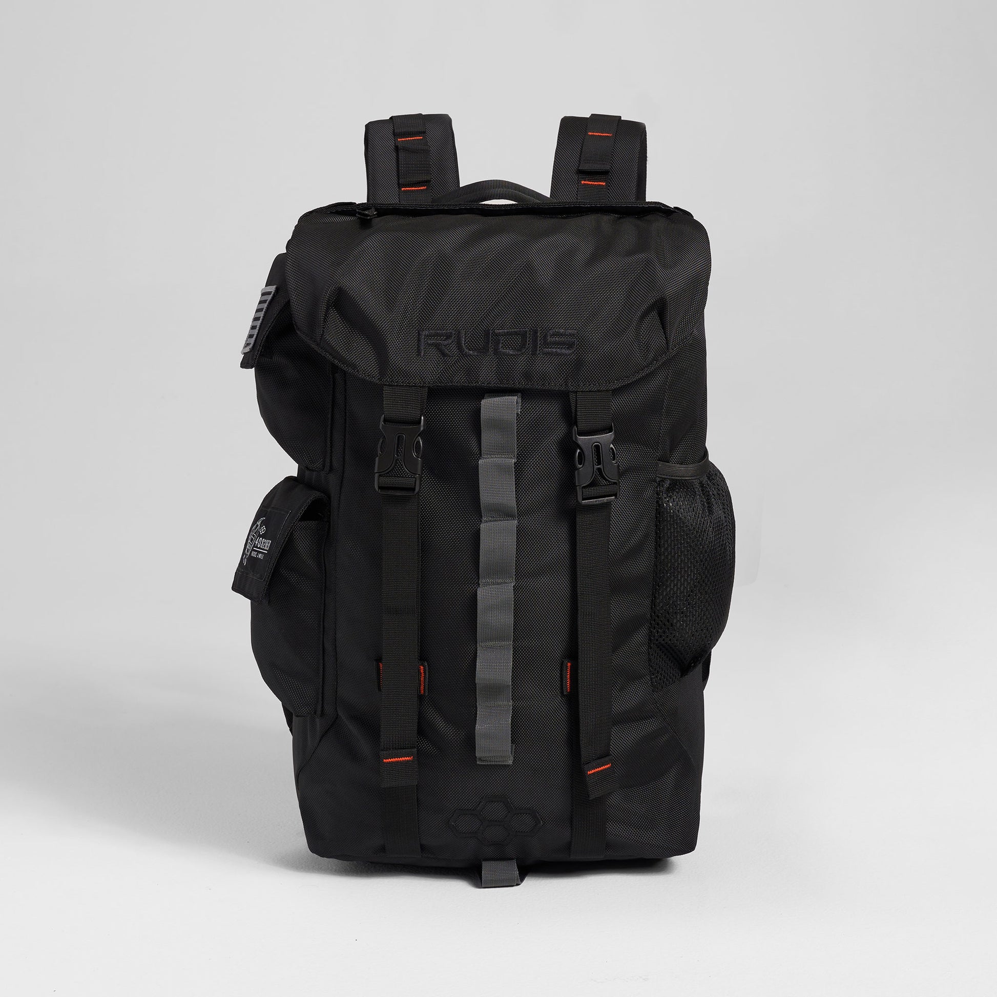 A black backpack featuring adjustable straps a reflective stripe and various compartments for storage