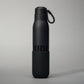 This image features a sleek black insulated water bottle with a textured grip and a loop for easy carrying perfect for hydration on the go