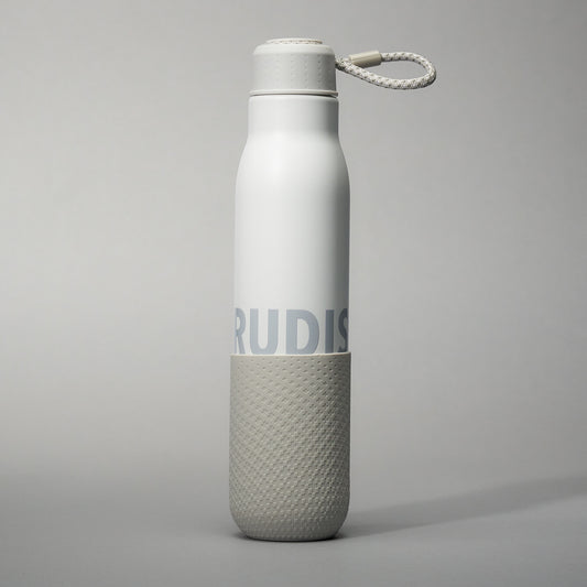 A sleek white reusable water bottle with a rubberized gray base and a textured grip featuring a minimalist design and a looped lid for convenience