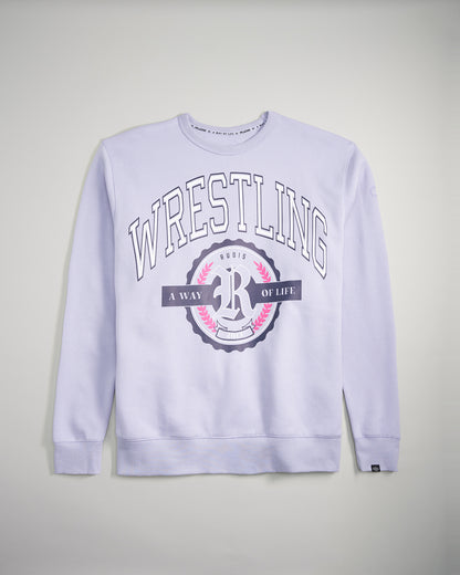 Light purple sweatshirt featuring bold text on wrestling and a circular logo designed for comfort and showcasing a wrestling lifestyle