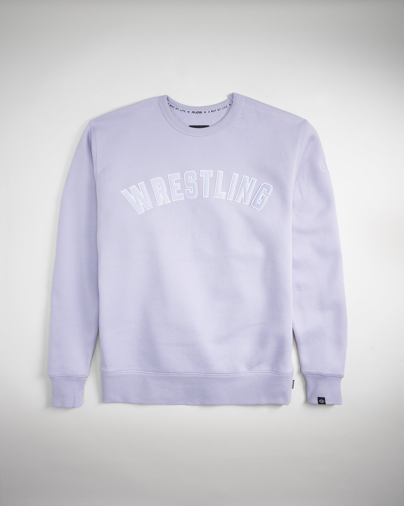 This light lavender sweatshirt features the word WRESTLING prominently displayed in bold white letters across the front perfect for casual wear or sports enthusiasts