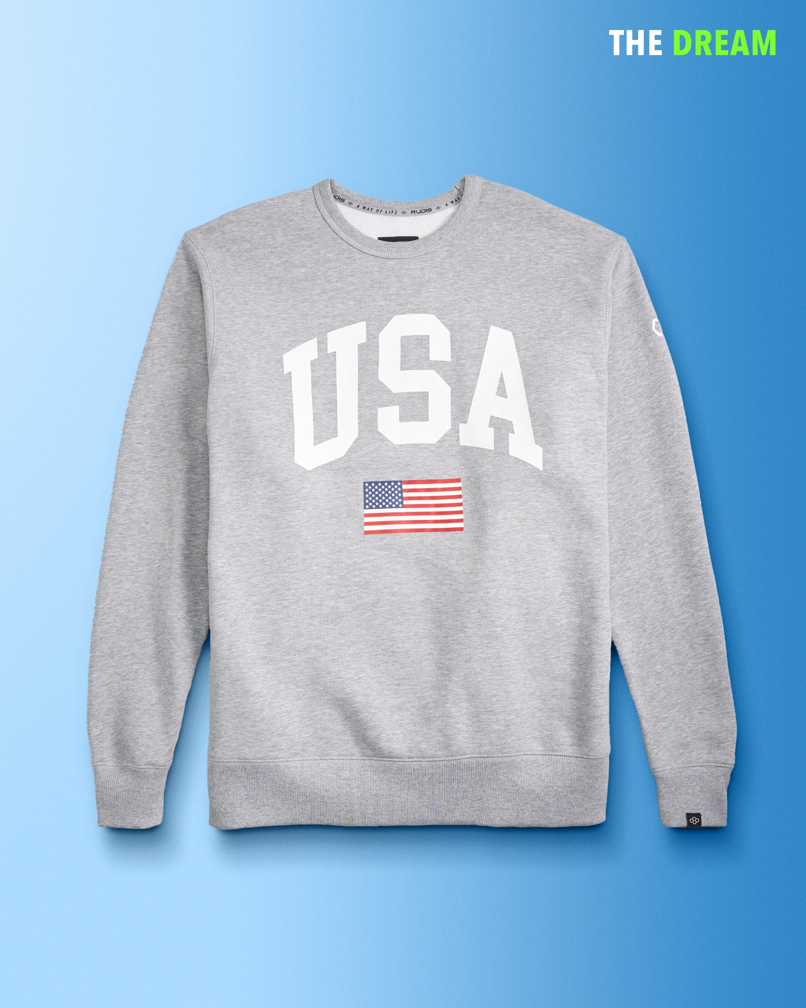 A gray sweatshirt featuring the word USA prominently displayed in bold white letters along with a small American flag graphic