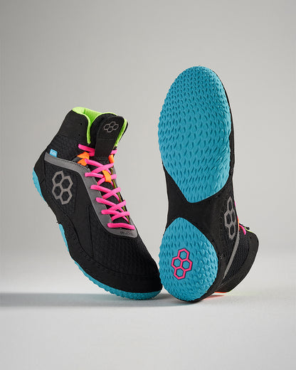 Stylish black athletic shoes with vibrant pink and green accents featuring a textured blue sole and innovative design suitable for performance and style