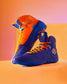 Vibrant high-top sneakers in blue and orange with playful design elements ideal for athletic and casual fashion