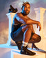 A confident male wrestler wearing a crown seated on a pedestal showcases his athleticism and a pair of stylish black wrestling shoes