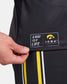 A close-up view of a black athletic garment featuring a prominent label that reads A WAY F LIFE alongside a yellow IOWA emblem with yellow and white stripes accentuating the design