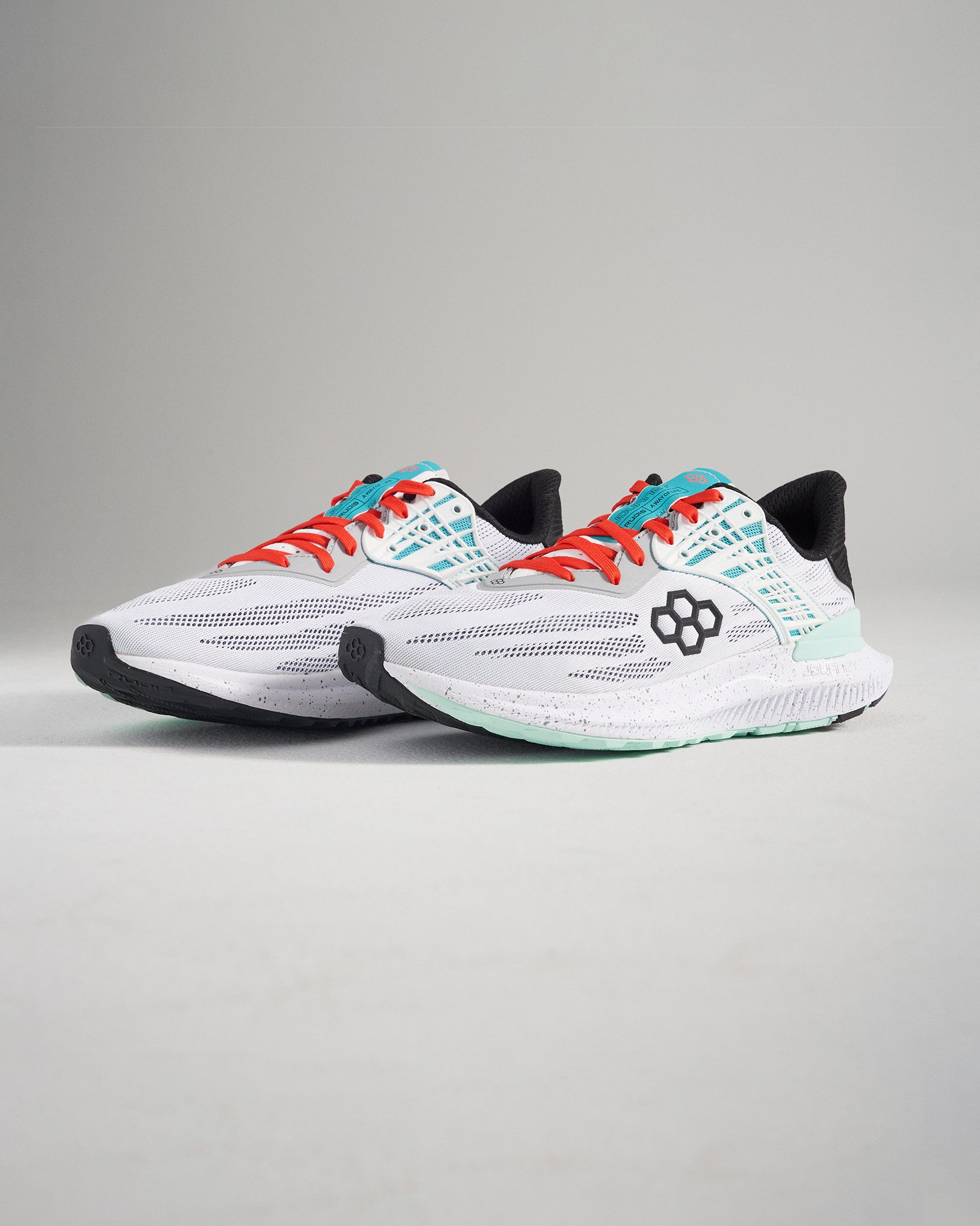 This image showcases a pair of modern white running shoes with vibrant details designed for comfort and performance