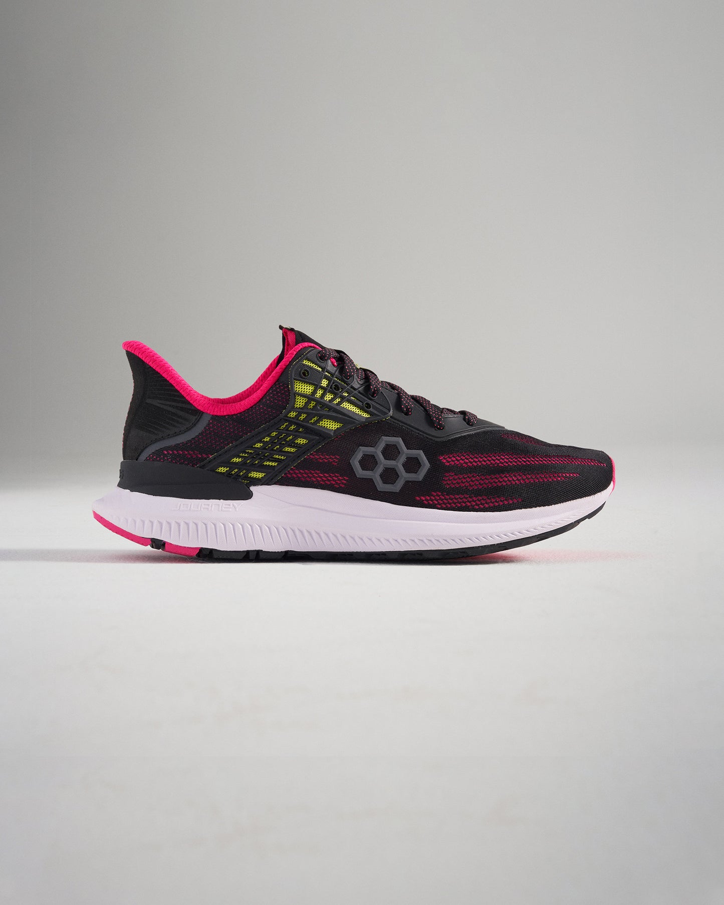 Dynamic black and pink running shoe featuring a breathable mesh upper and a cushioned sole for enhanced performance