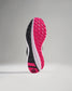 A stylish running shoes sole featuring a vibrant pink and black design showcasing its grip and performance-oriented features