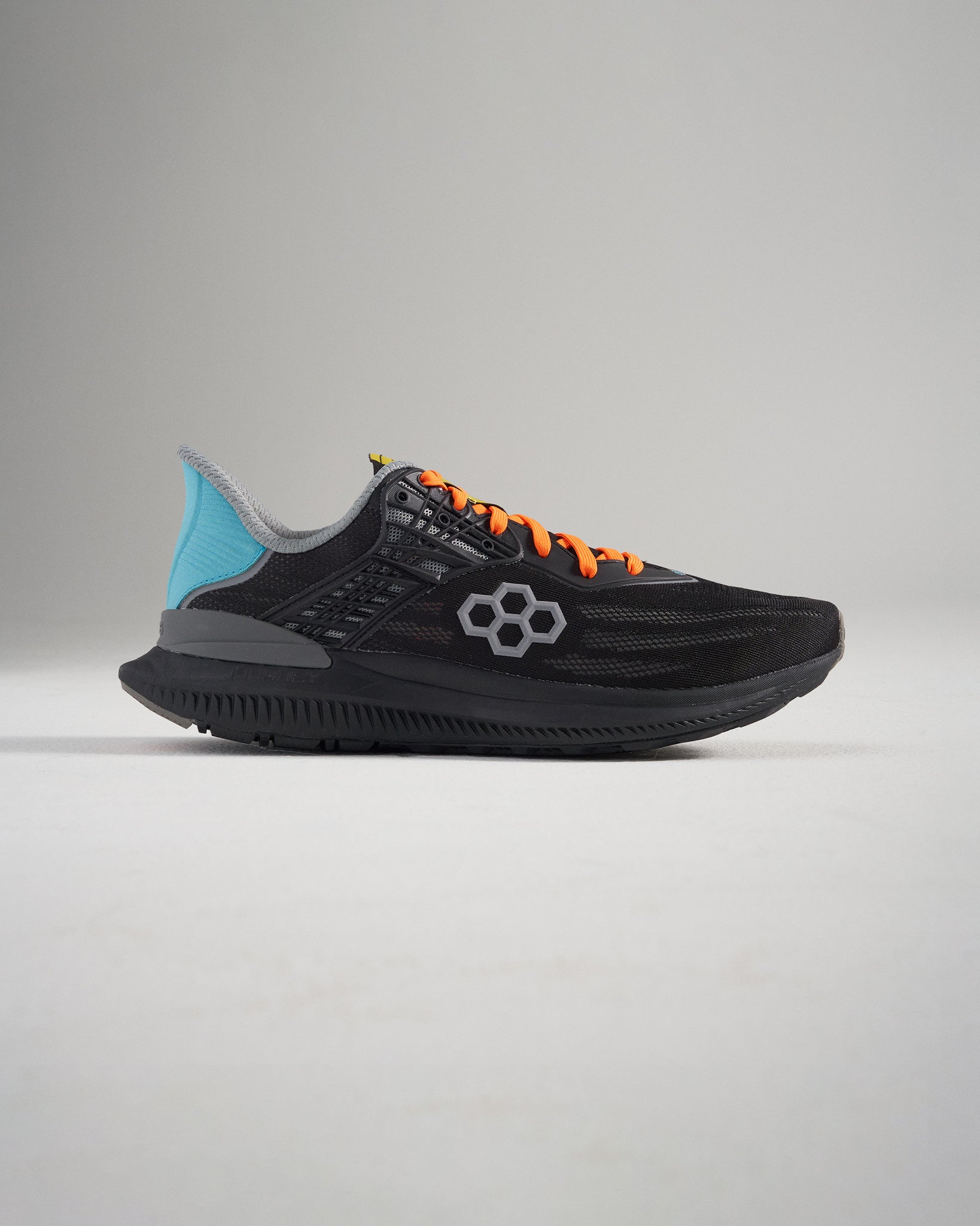 A modern black running shoe featuring a breathable mesh upper vibrant orange laces and a stylish blue heel counter