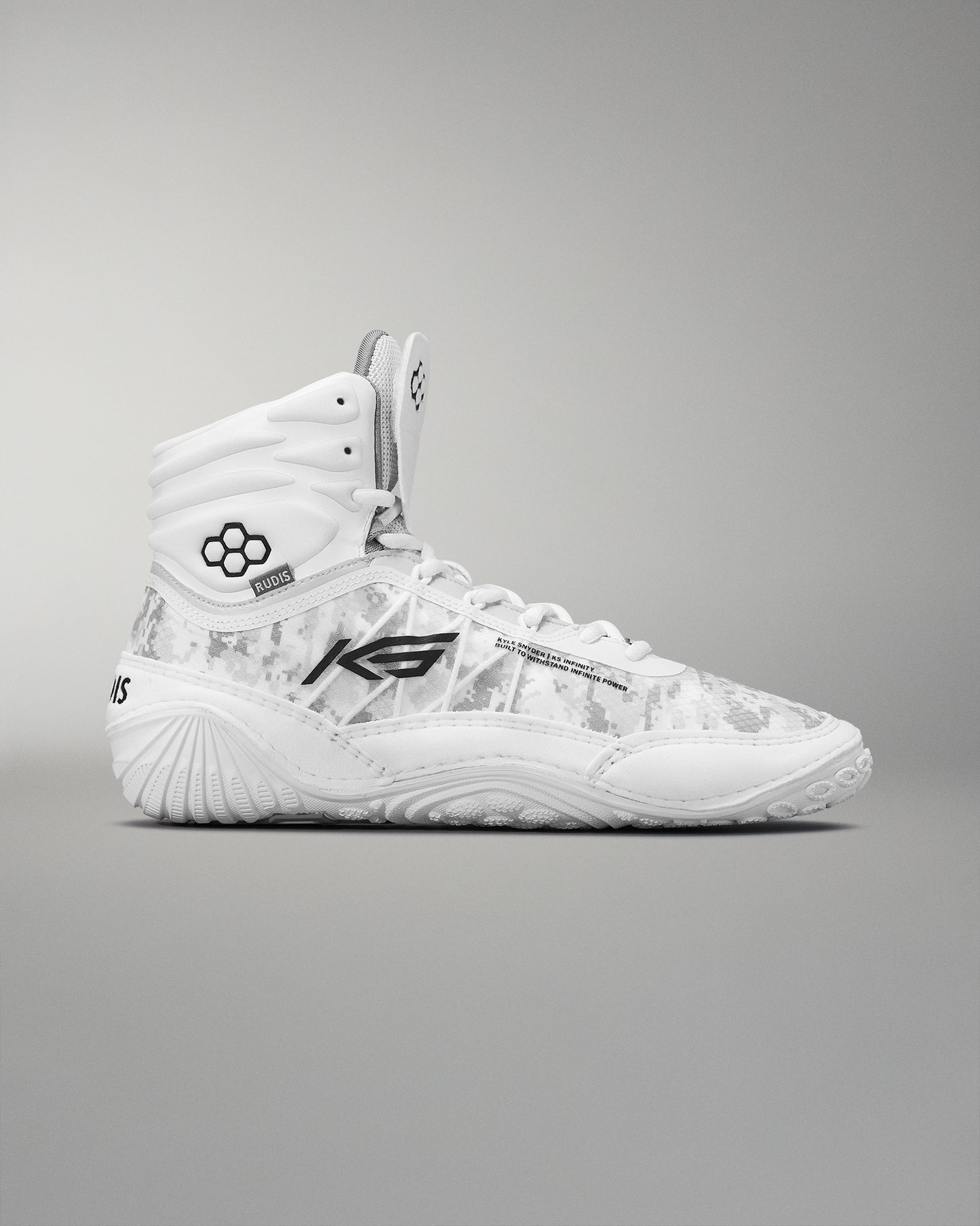 High-top athletic shoe displaying a white design with a subtle camouflage pattern and black accents, featuring a padded collar for support and a traction-focused sole.