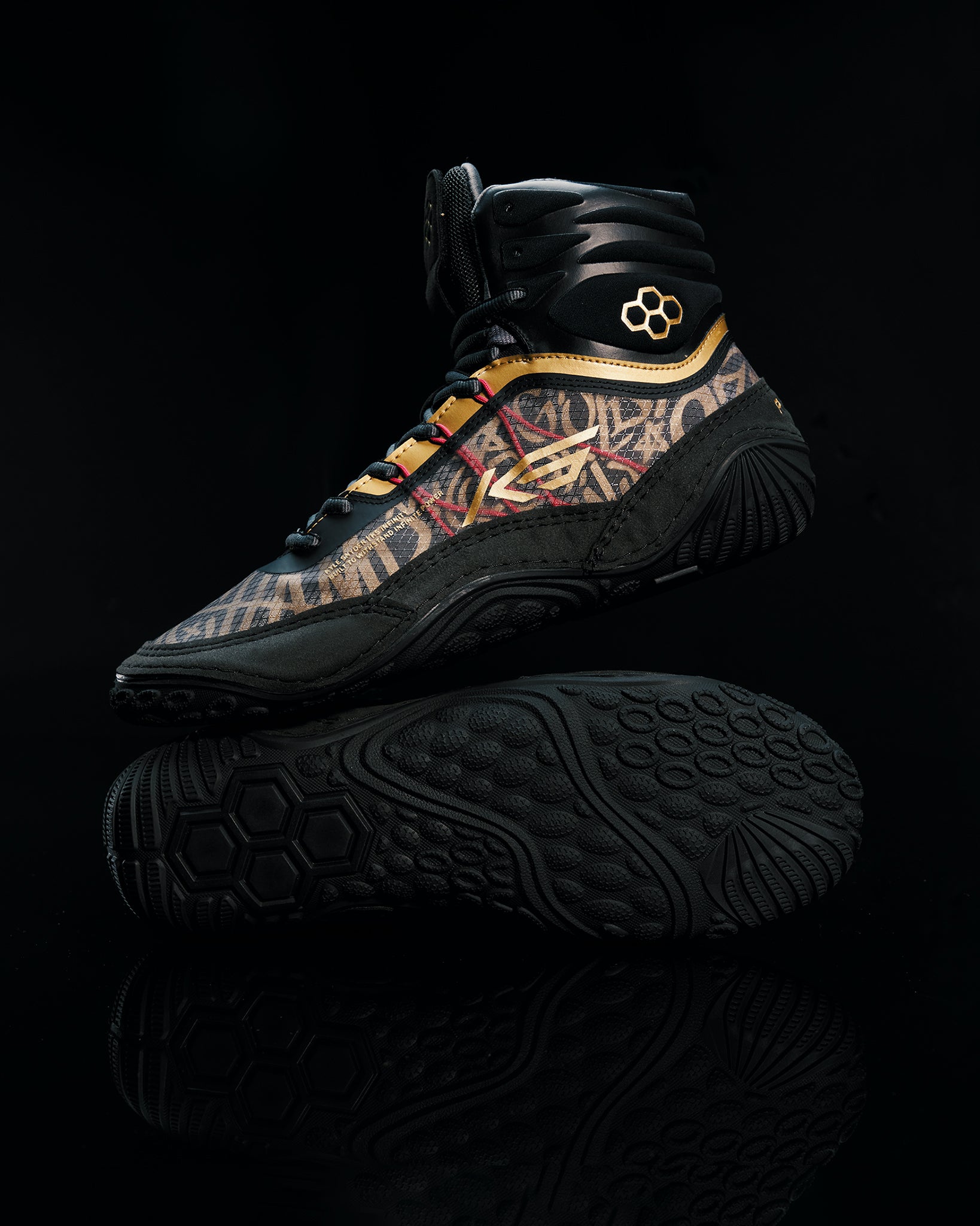 A stylish black high-top athletic shoe featuring a unique patterned upper bold colors and intricate sole design ideal for performance and fashion