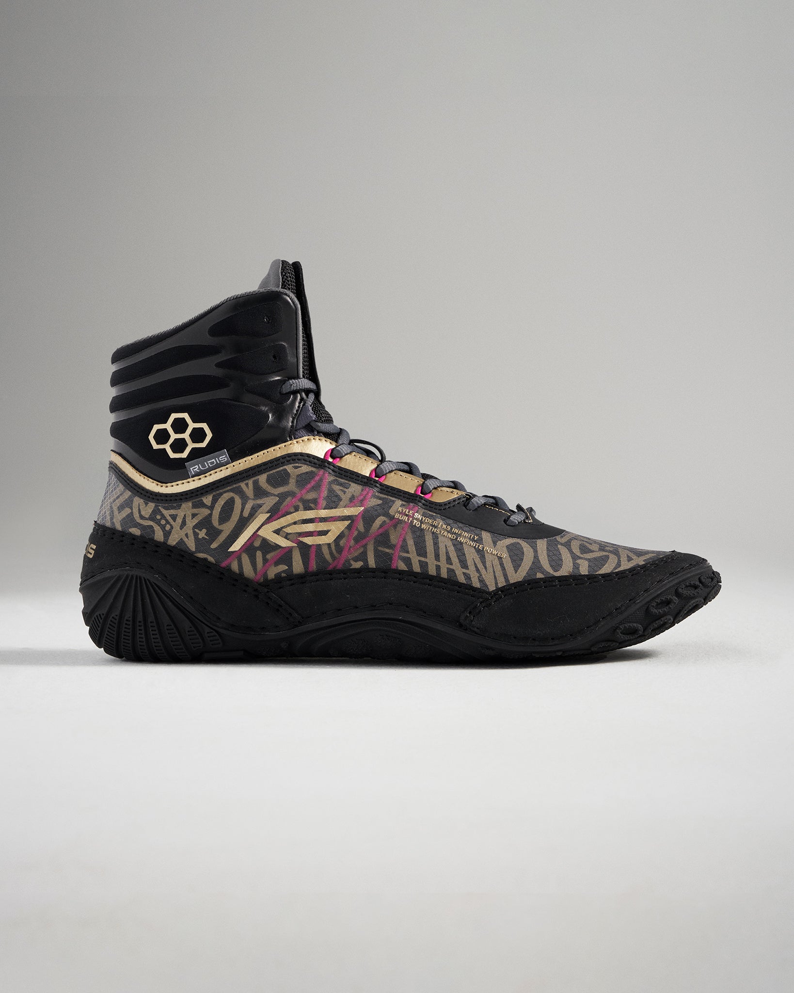 A modern black wrestling shoe with intricate graphics and a high-top design for optimum ankle support and performance