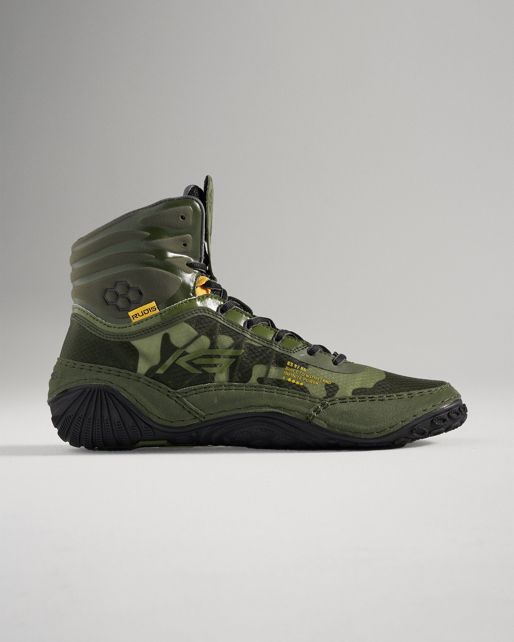 A side view of green camouflage wrestling shoes featuring a high-top design durable material and textured soles for superior grip