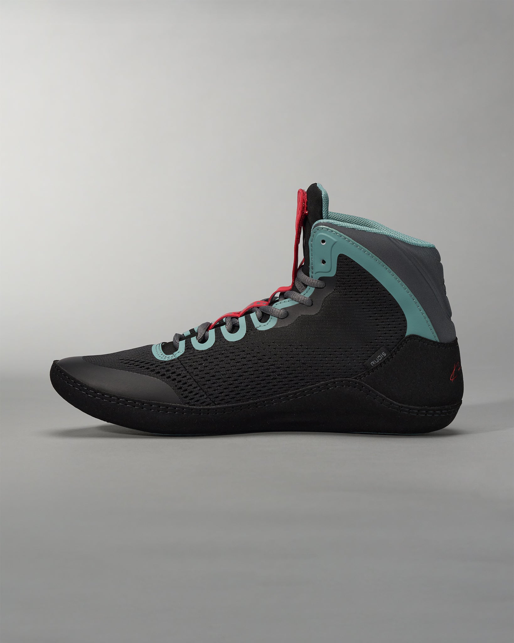 A stylish black climbing shoe featuring a high-top design with a breathable mesh upper turquoise accents and red laces ideal for performance and comfort