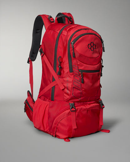 A vibrant red backpack with multiple compartments adjustable straps and a sleek design suited for outdoor activities