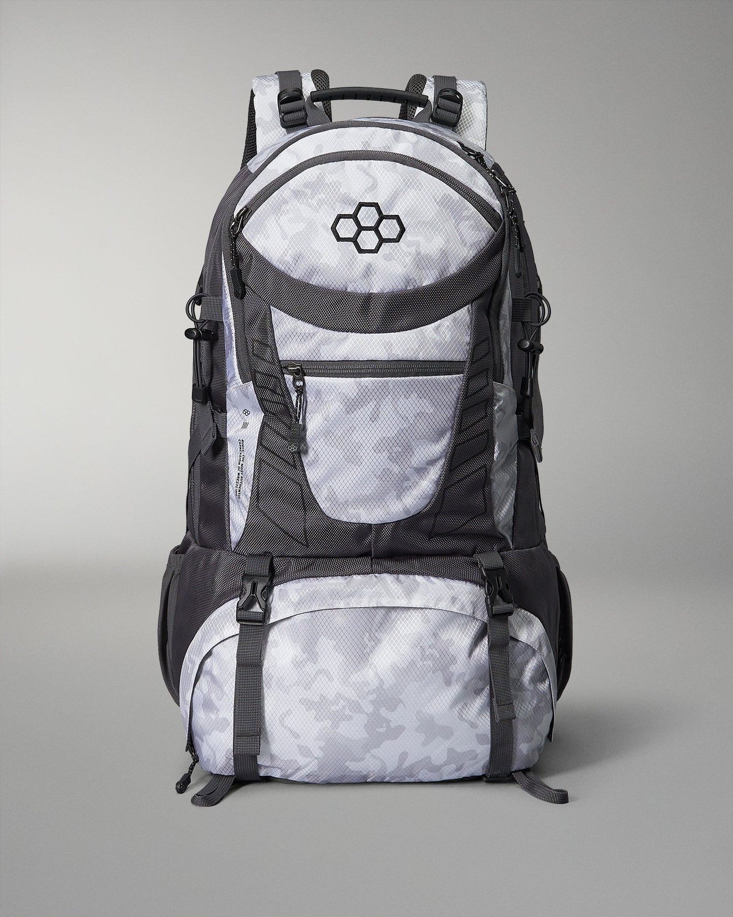 A stylish gray and black backpack with a modern design and multiple compartments ideal for outdoor adventures or daily commuting