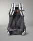 A sleek black backpack designed with padded straps ergonomic support and a vibrant orange buckle for added functionality