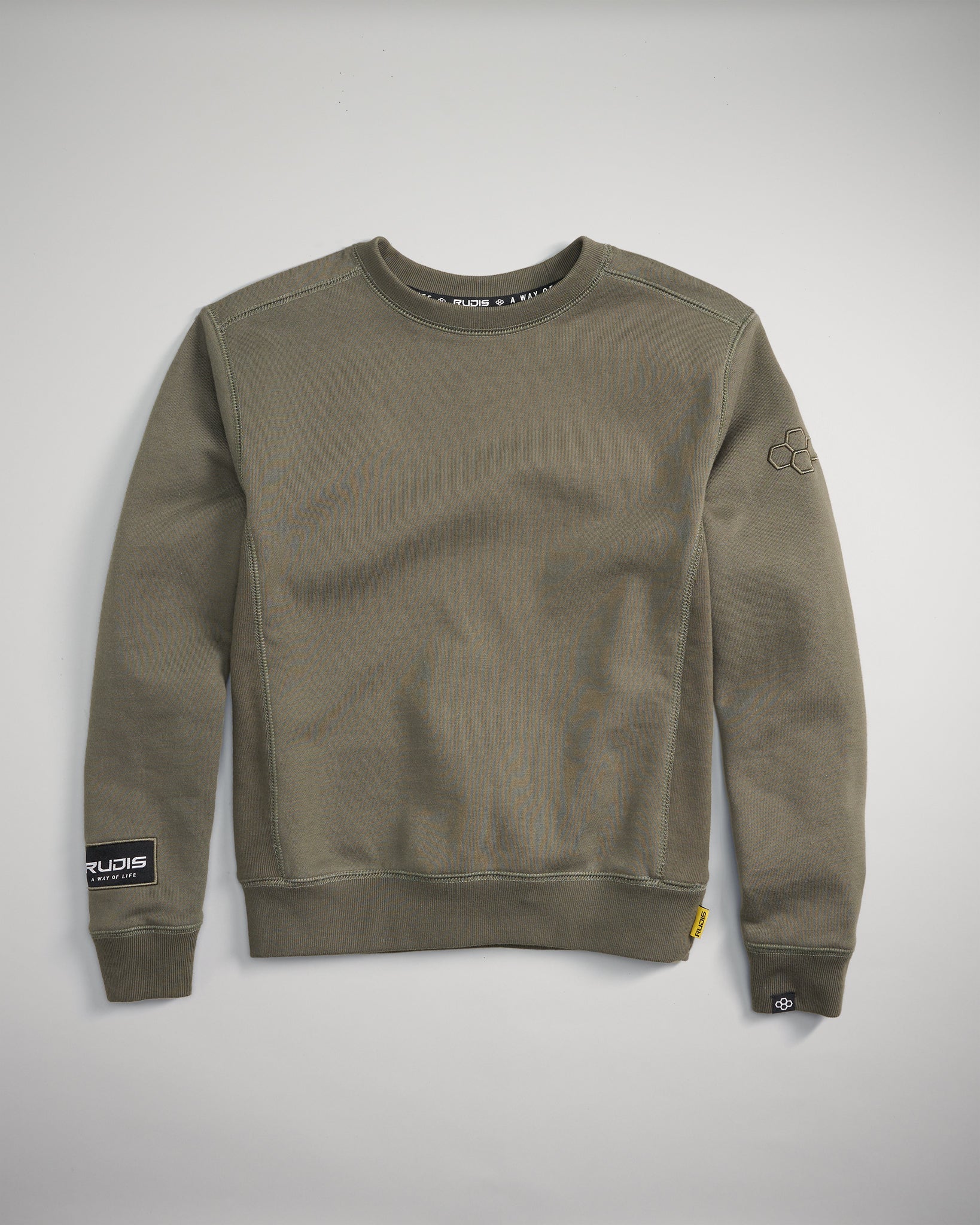 An olive green crewneck sweatshirt featuring a soft fabric ribbed hem and cuffs and branding details on the sleeve and chest