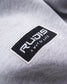 A close-up image of a gray garment featuring a rectangular logo patch that reads RUDIS A WAY OF LIFE in white text on a black background