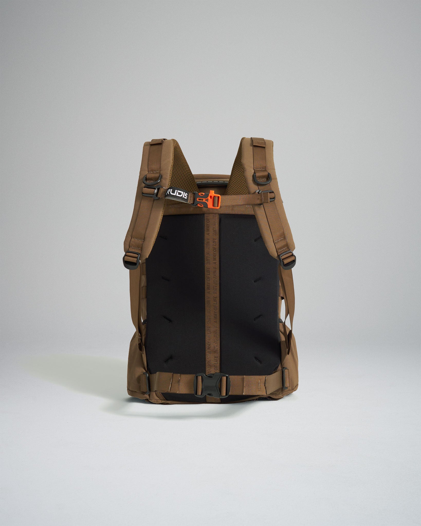 A sleek brown backpack designed for outdoor use featuring adjustable straps a streamlined silhouette and modern design elements