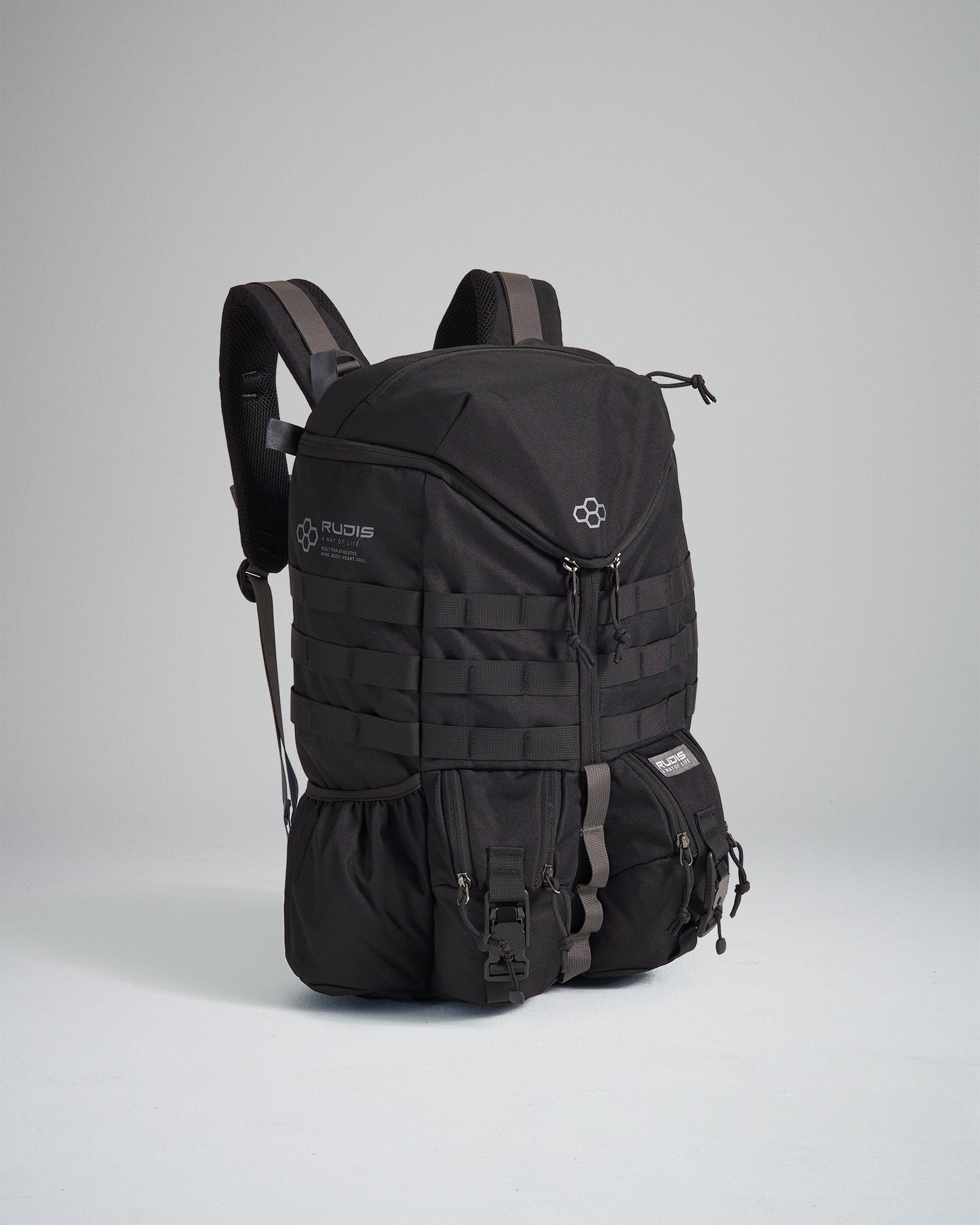 A sleek black tactical backpack featuring multiple compartments adjustable straps and a modern aesthetic suitable for everyday use and outdoor activities