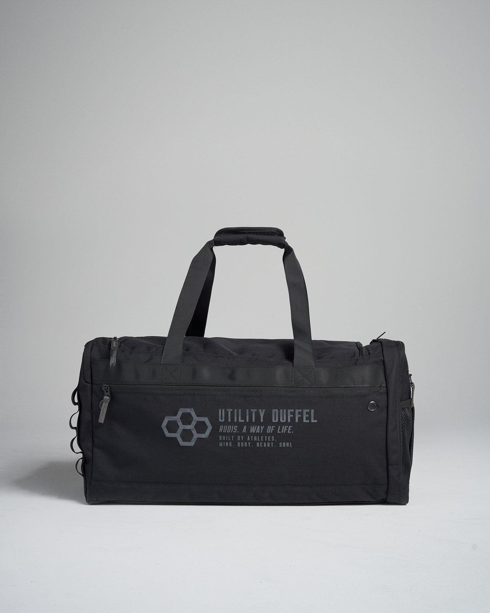 A sleek black utility duffel bag featuring the text Utility Duffel and a modern design ideal for athletes and travel