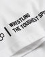 A close-up view of a white t-shirt featuring bold black text that reads WRESTLING THE TOUGHEST SPORT