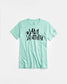 A mint green t-shirt featuring bold black lettering that reads Lady Liberty along with a small Statue of Liberty graphic