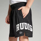 Childrens black athletic shorts with RUDIS printed in white at the side featuring a comfortable elastic waistband and side pockets