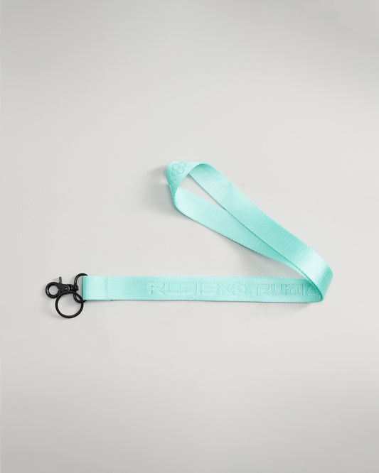 A chic mint green lanyard with a sturdy black clip designed for holding keys or ID badges featuring a subtle textured pattern