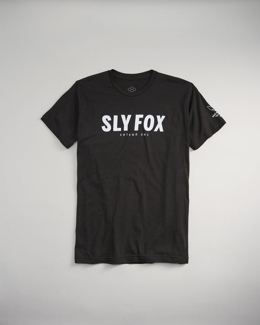 A simple black t-shirt featuring bold white text stating SLY FOX and a subtle Russian translation underneath