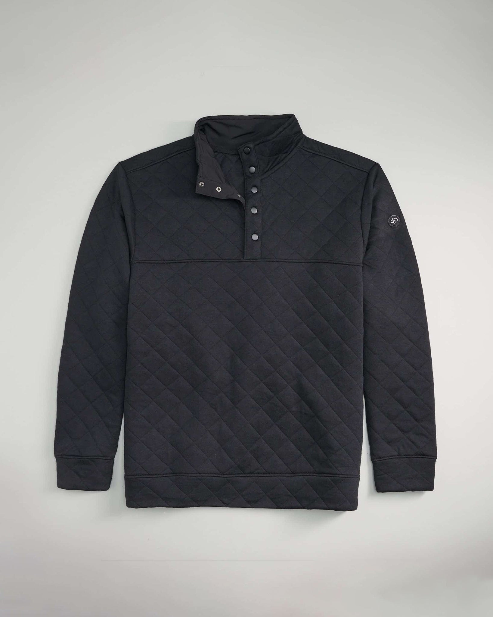 A black quilted pullover featuring a high collar and buttoned placket designed for warmth and style