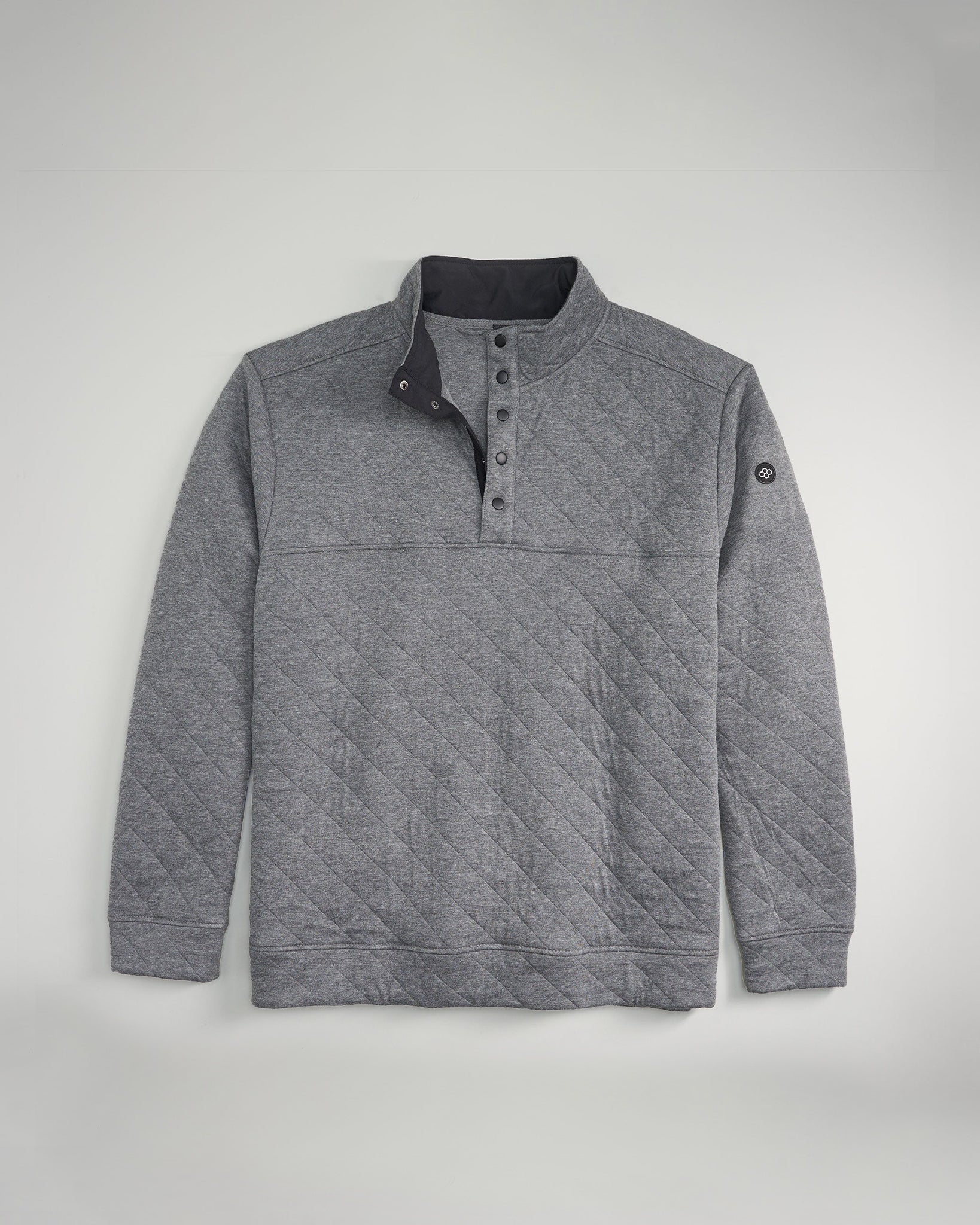 A stylish gray quilted pullover with a half-button closure and a black collar designed for both comfort and warmth