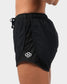 Black athletic shorts with a reflective logo positioned at the hem showcasing a sleek design and comfy fit