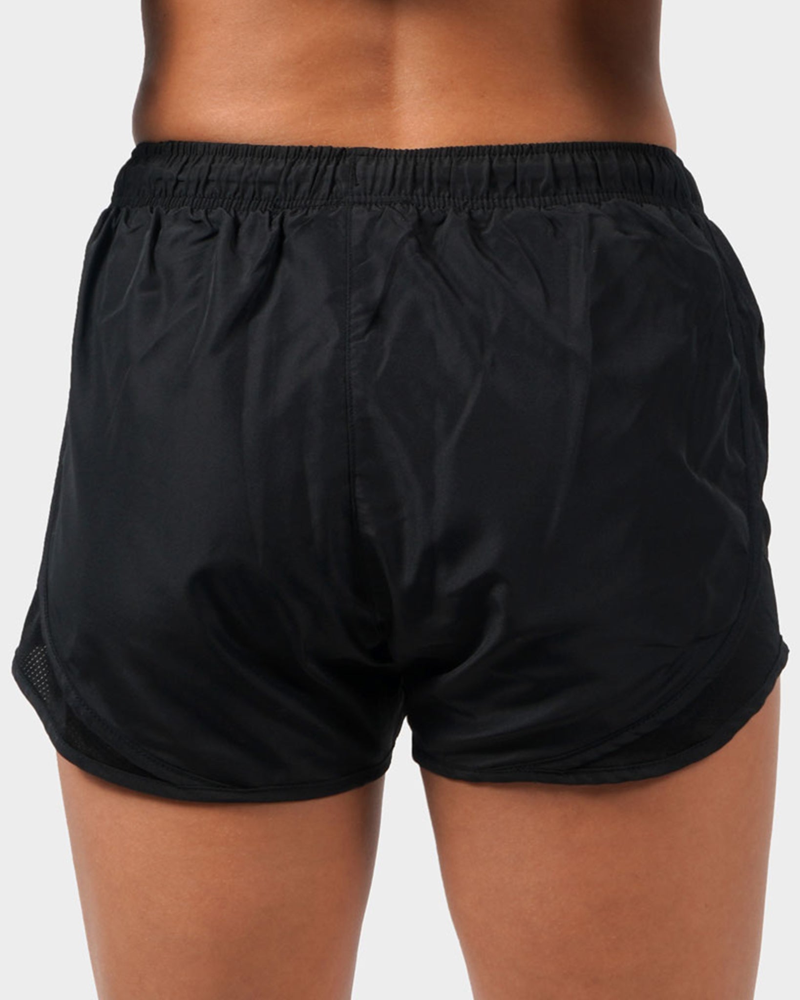 Black athletic shorts reflecting a lightweight design with a comfortable elastic waistband and side mesh panels for breathability