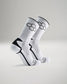 A pair of white athletic socks featuring a stylish design with hexagonal patterns and black accents for enhanced support and comfort during sports activities