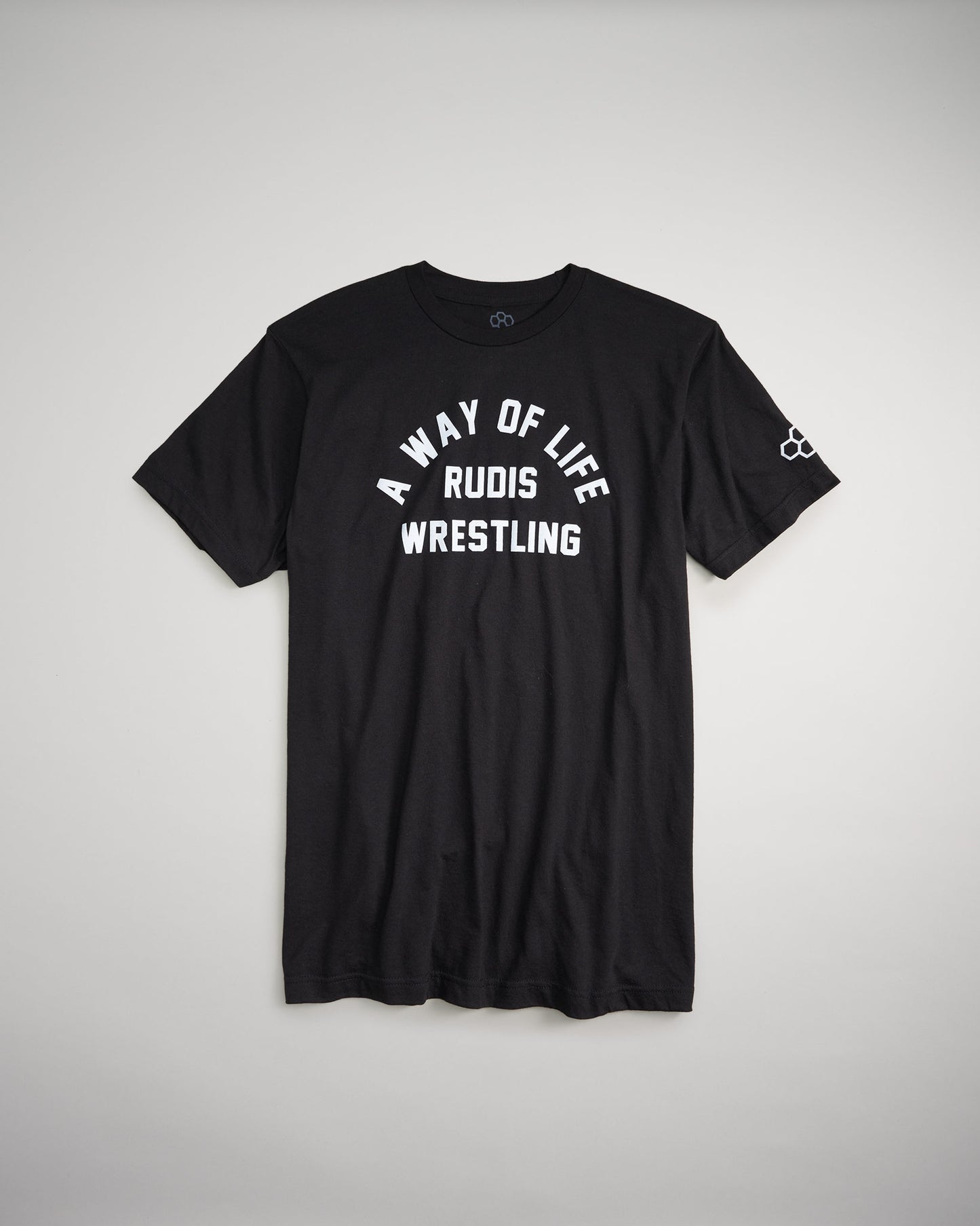 A black t-shirt featuring bold white text that reads A WAY OF LIFE RUDIS WRESTLING on the front emphasizing a wrestling theme