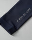 A dark navy fabric sleeve displays the light gray text 'A WAY OF LIFE,' highlighting its smooth texture and neat stitching against a soft gray background.