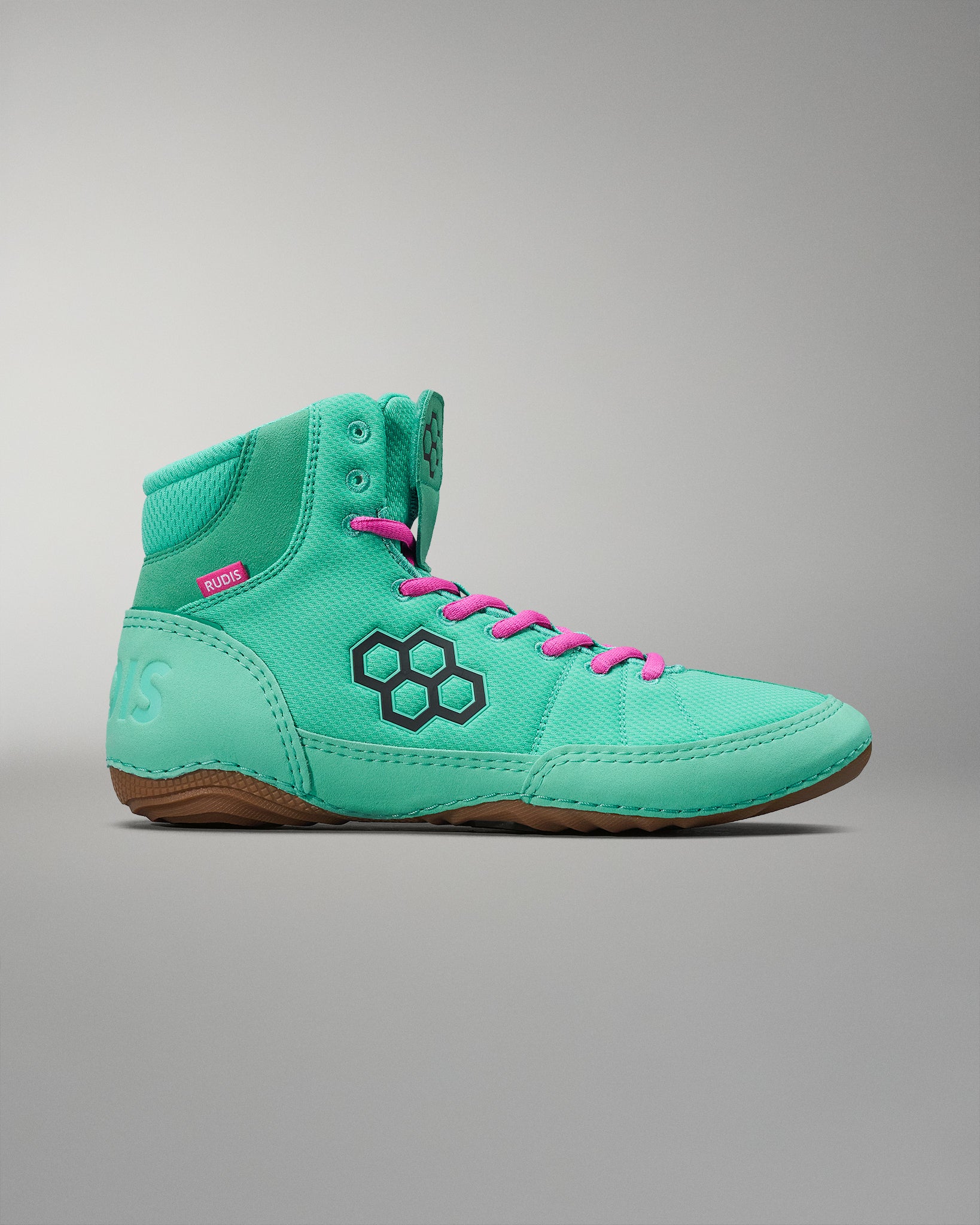 High-top wrestling shoe with a turquoise upper, black honeycomb design, and pink laces, complemented by a light brown sole.