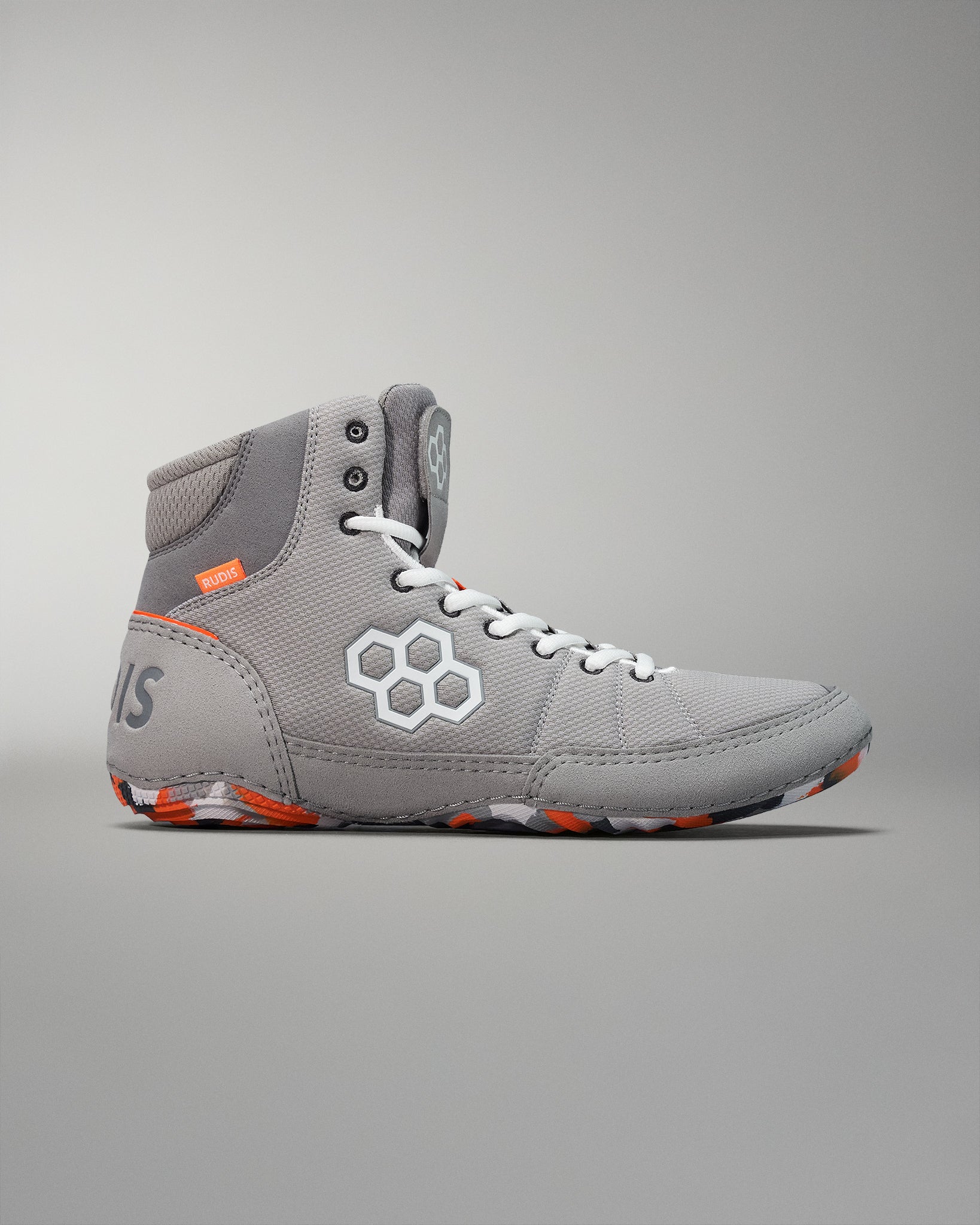 High-top wrestling shoe in gray with orange accents, featuring a textured upper for ankle support and a grip-enhancing rubber sole.