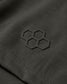 An olive green fabric with a textured hexagonal logo in the corner highlights a modern, minimalist aesthetic, complemented by neat stitching.