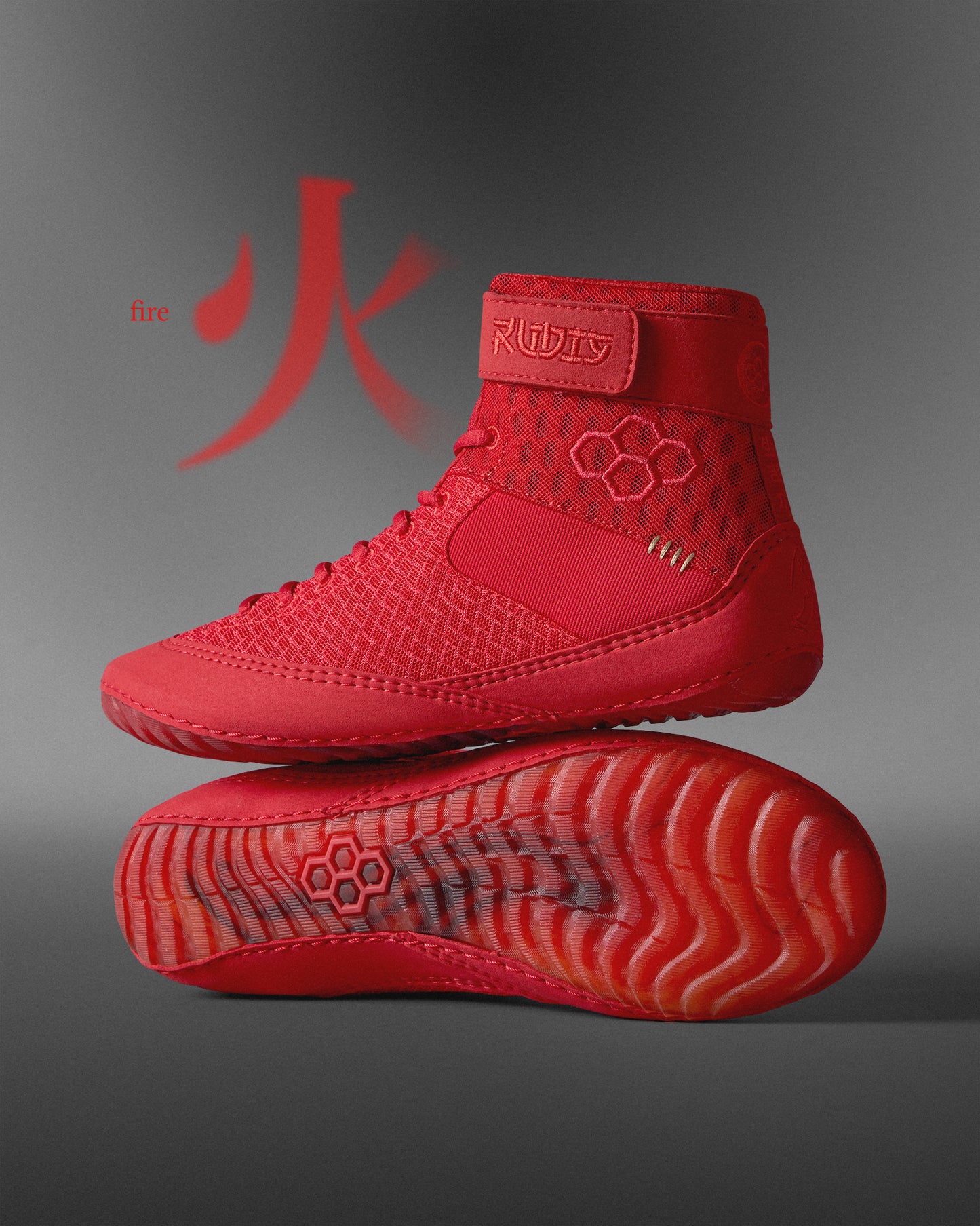 A striking red athletic shoe combines high-top support with a hexagonal traction design, complemented by the text 'fire' against a gradient gray background to emphasize its dynamic style.