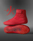 A striking red athletic shoe combines high-top support with a hexagonal traction design, complemented by the text 'fire' against a gradient gray background to emphasize its dynamic style.