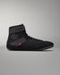 High-top black athletic shoe with a textured upper, rubber sole for traction, and a red 'RUDIS' tag for branding.