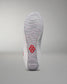 The sole of a white athletic shoe displays a textured design for grip, featuring a distinctive red hexagonal logo, set against a soft gray background.