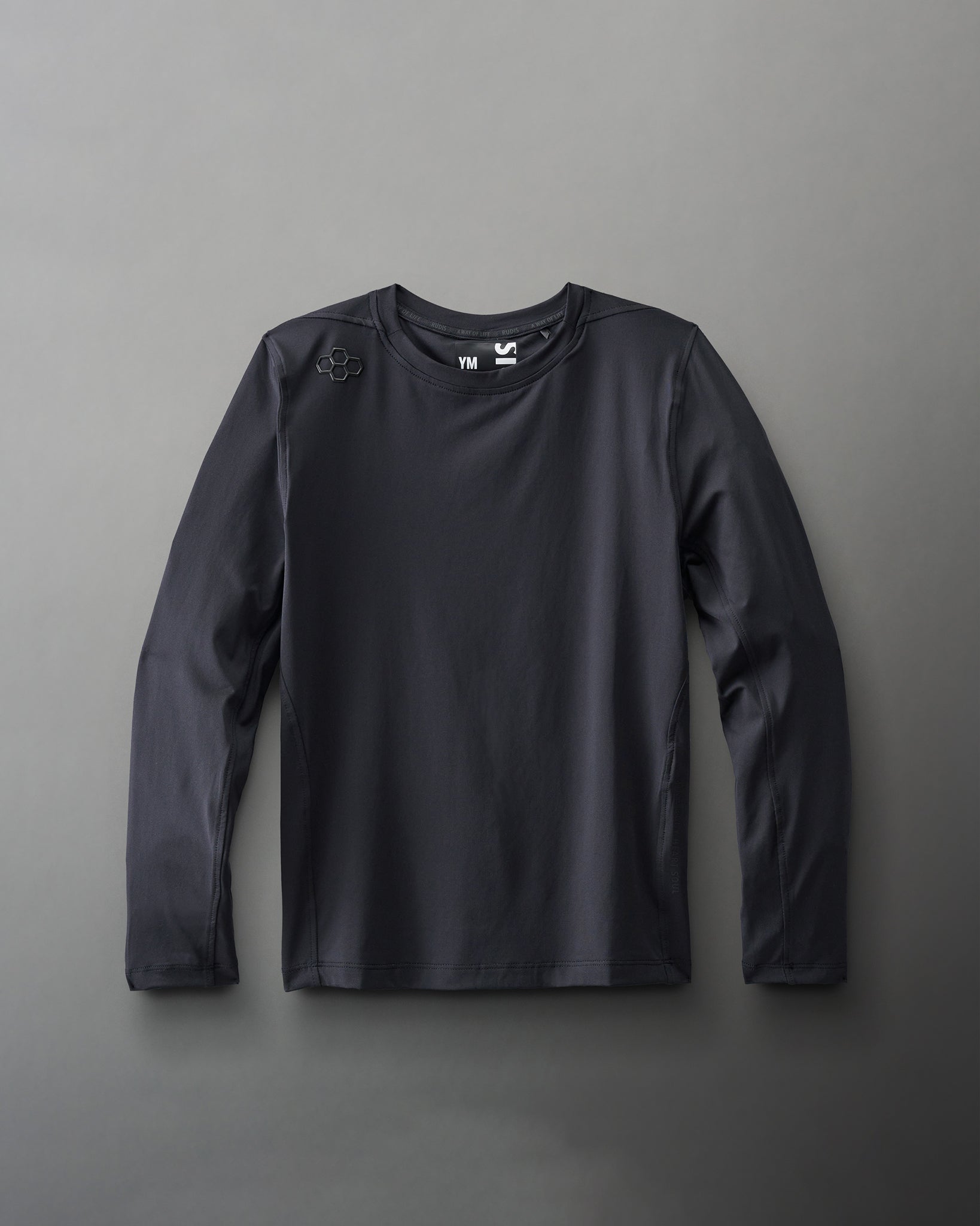 A black long-sleeve athletic shirt with a minimalistic design and a logo on the shoulder, suited for comfort and performance.