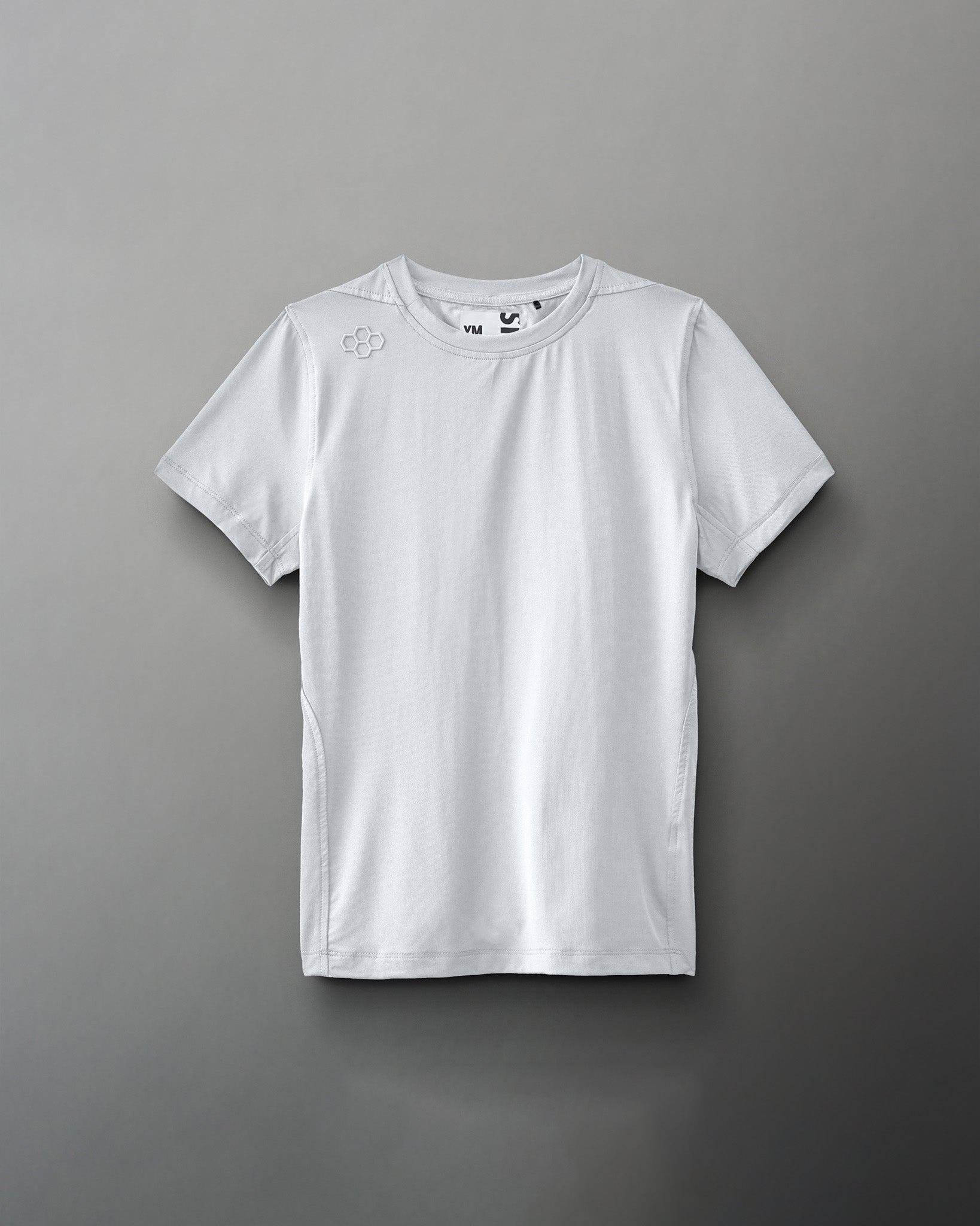 A gray athletic t-shirt showcases a lightweight fabric, crew neckline, and subtle branding on the shoulder, designed for comfort and versatility in active wear.