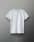 A plain white athletic shirt, minimalistically designed with a round neck and short sleeves, features a small logo on the shoulder, highlighting its lightweight and functional nature.