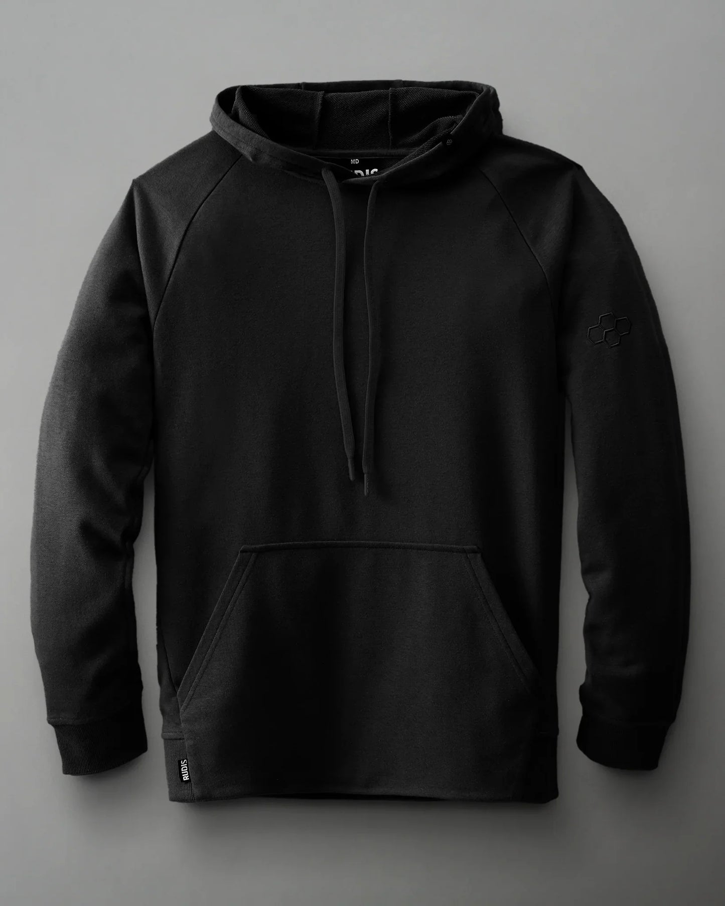 A black hoodie with a drawstring and kangaroo pocket, featuring ribbed cuffs and a subtle logo, displays a comfortable and modern style.